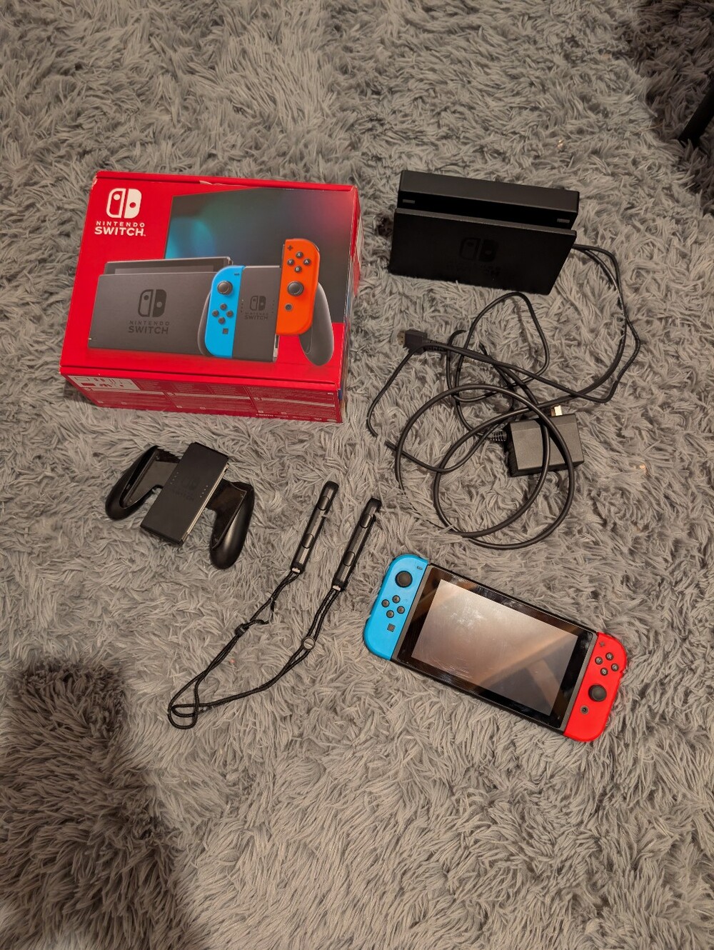 Nintendo Switch with Blue Left & Red Right Joy‑Con Controllers